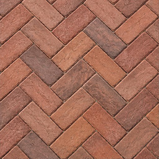 Installed red brick pavers in a herringbone pattern